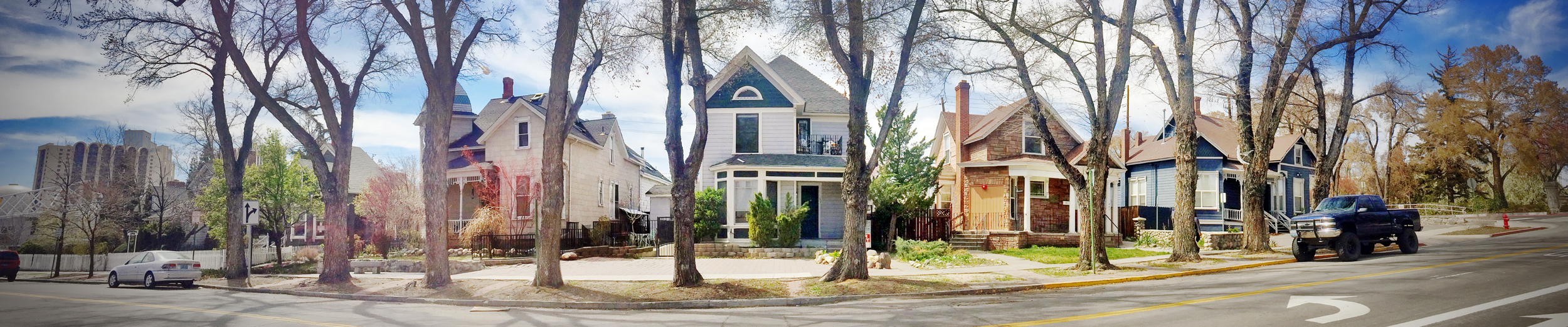 vibrant image showing four of the historic buildings on Center Street with the Circus Circus Hotel/Casino nearby.